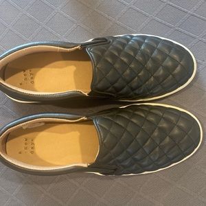 Size 8 Slip on black, quilted top shoes.